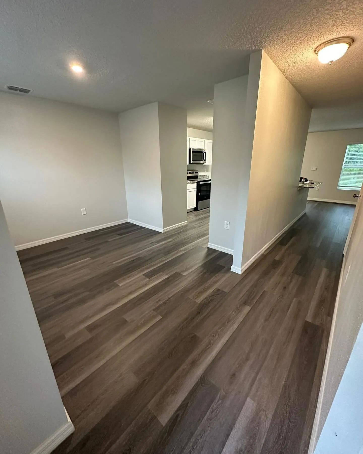 Laminate plank flooring in a residential hallway